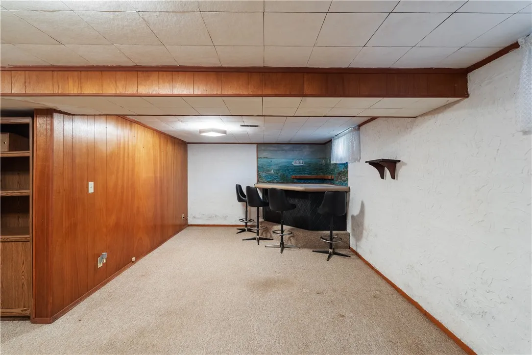 Partially finished walk-out basement offers additional living & storage space! Walks-out to garage.