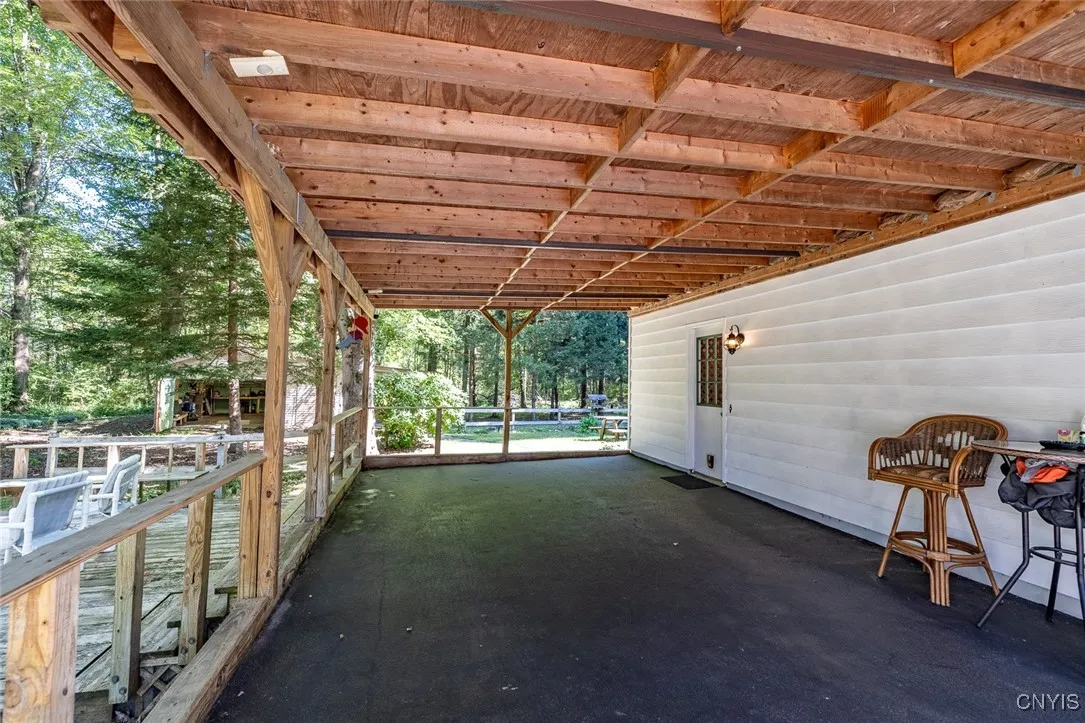 Carport and side deck located off of the garage.