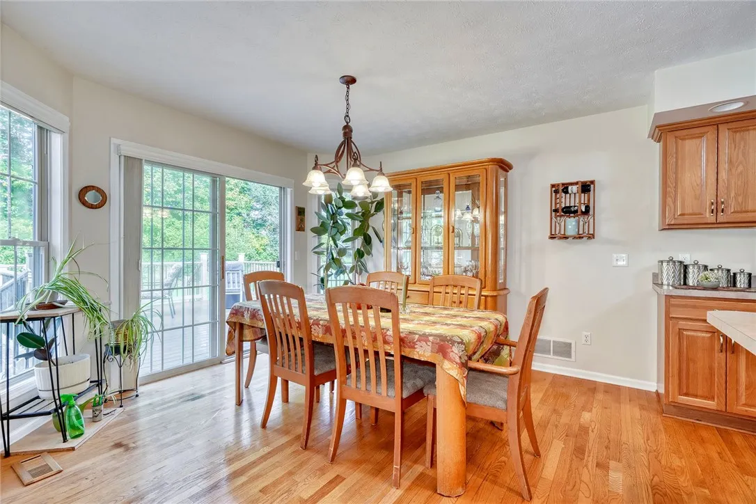 Dining area with hardwood floors