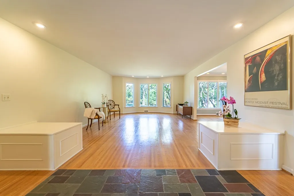 The foyer opens to a spacious living room.