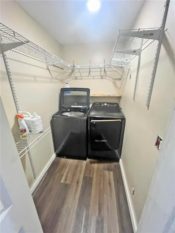 Laundry with access to attic crwlspace