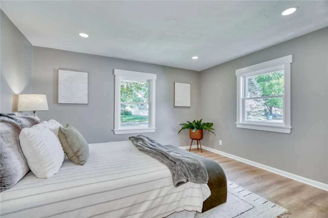 Peaceful retreat with thoughtful layout — primary on one side, secondary bedrooms on the other.