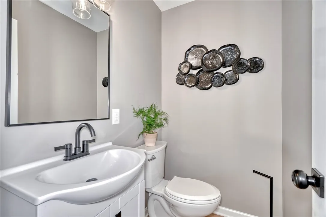 Brand-new half bath with modern finishes