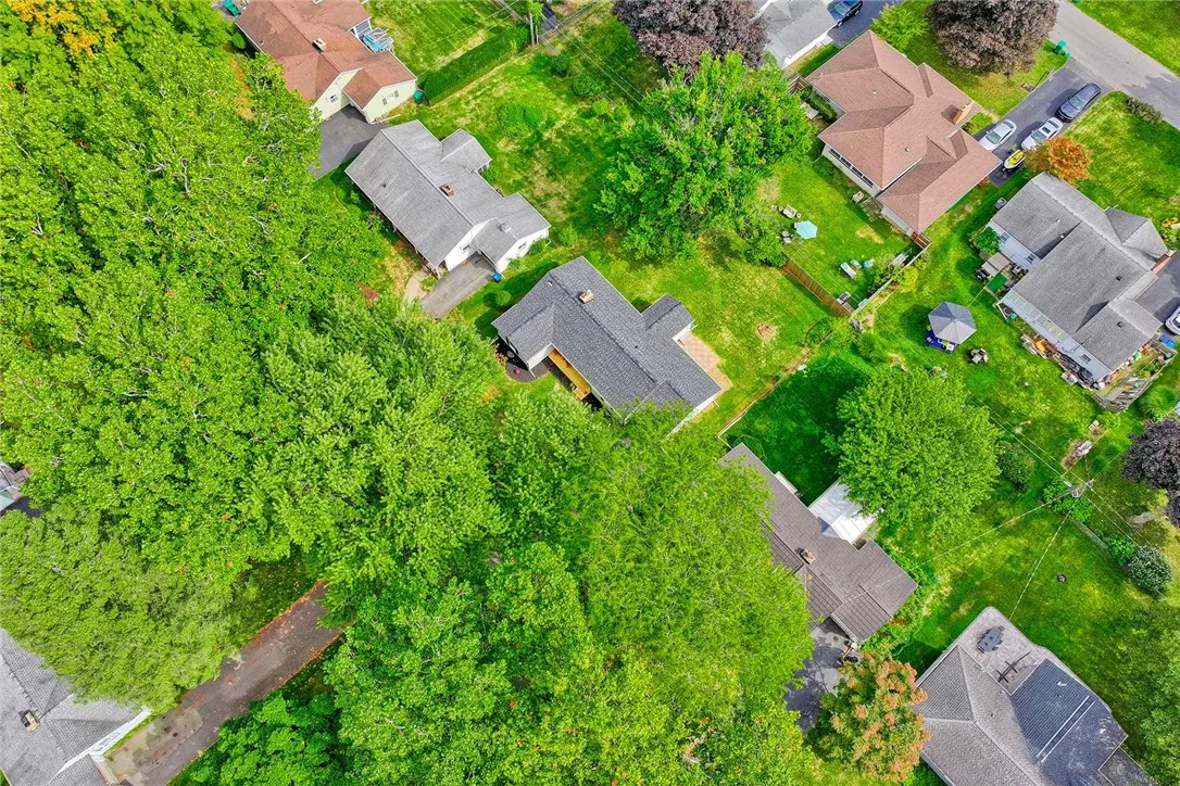 Like-new construction in a beloved Irondequoit neighborhood — every detail reimagined.