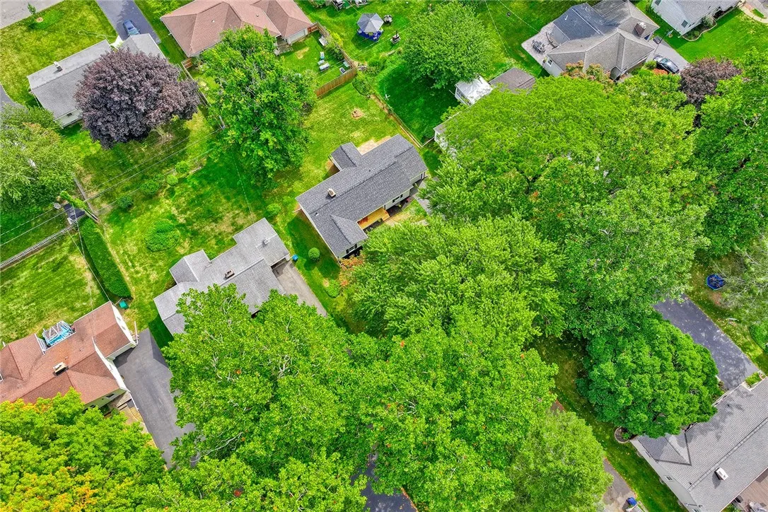 Like-new construction in a beloved Irondequoit neighborhood — every detail reimagined.