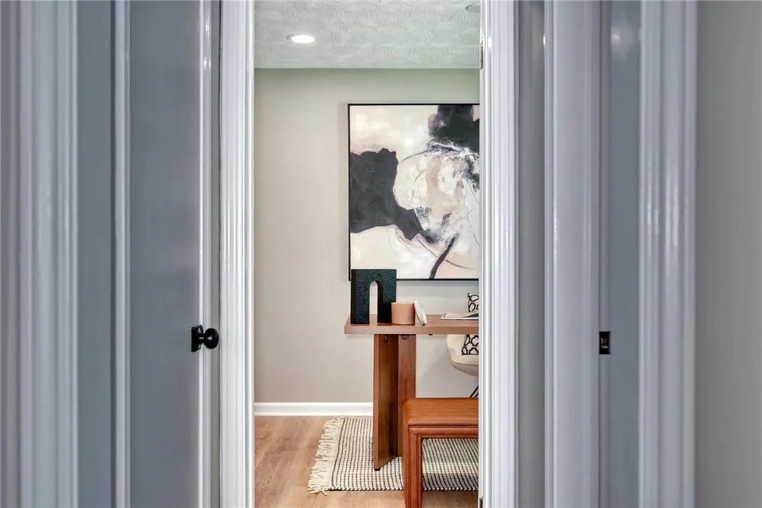 Flexible space for a home office, guest room, or playroom — with adjacent half bath.