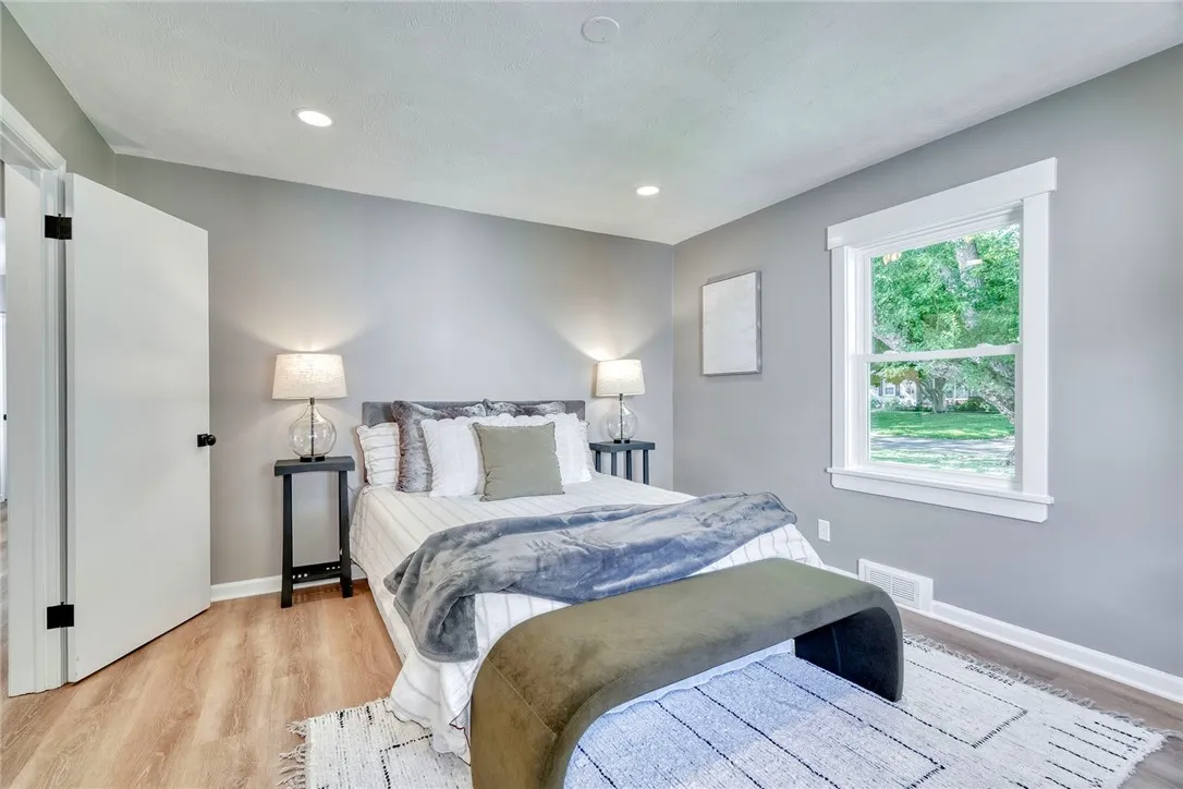 Peaceful retreat with thoughtful layout — primary on one side, secondary bedrooms on the other.