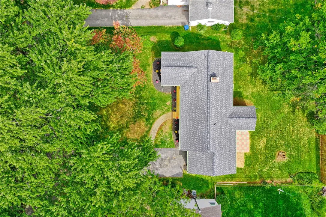 Like-new construction in a beloved Irondequoit neighborhood — every detail reimagined.