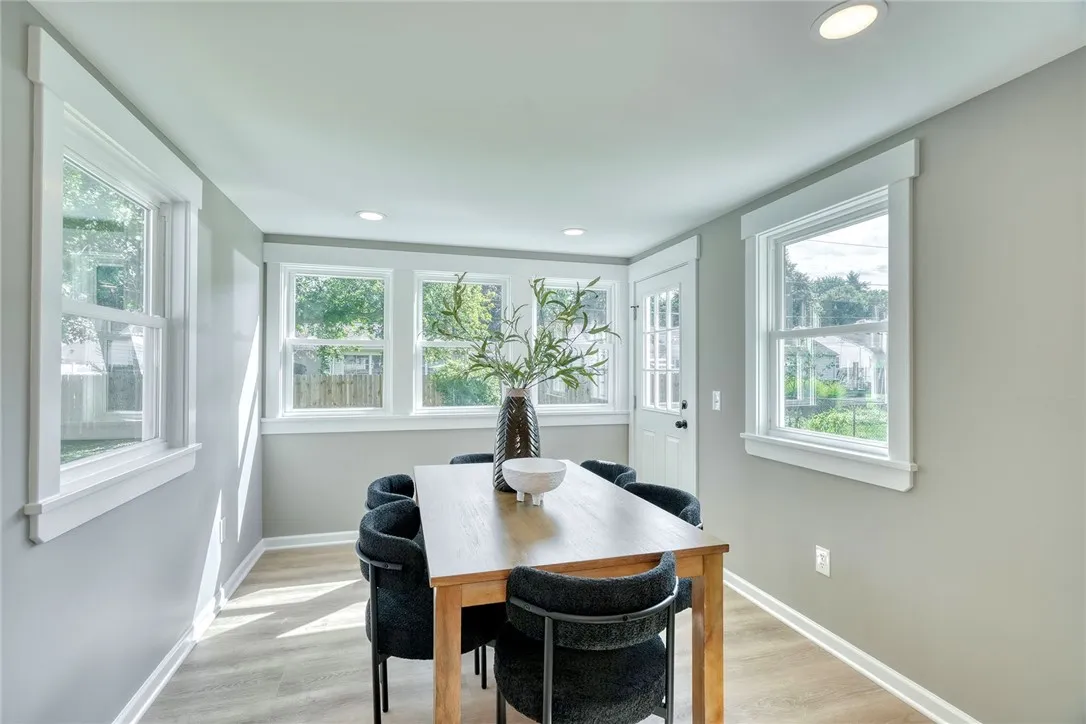 Seamless indoor-outdoor connection with patio and backyard access.