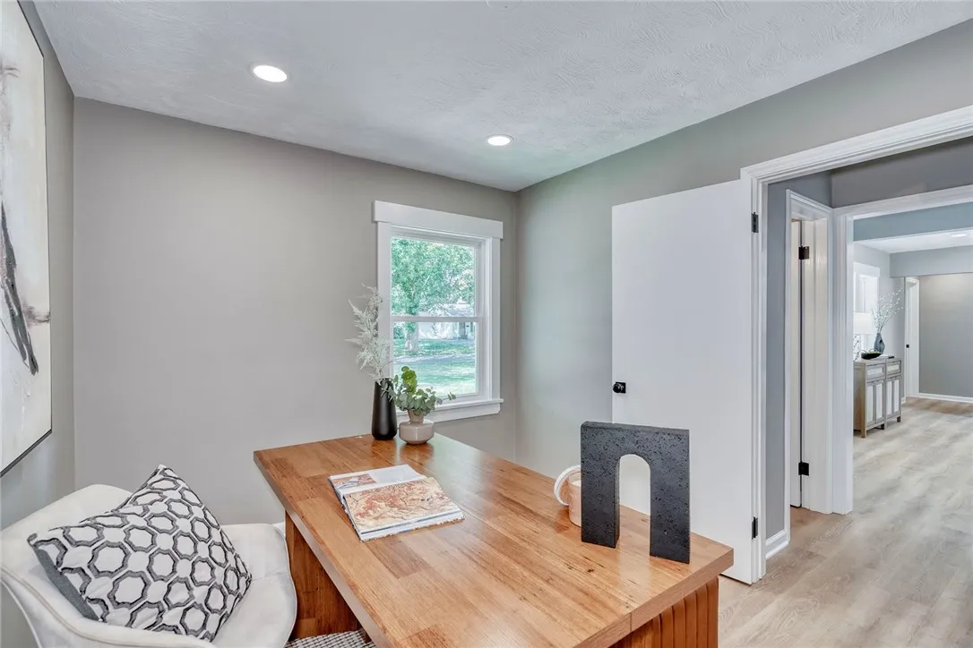 Flexible space for a home office, guest room, or playroom — with adjacent half bath.