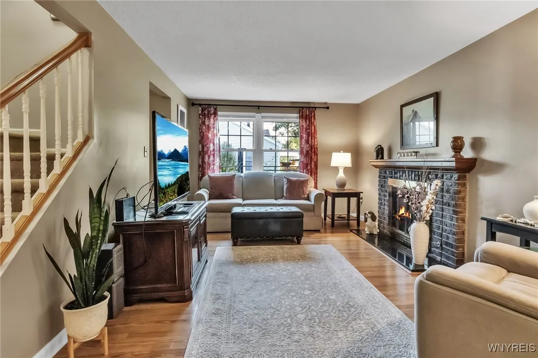 Large living room with a lot of natural light