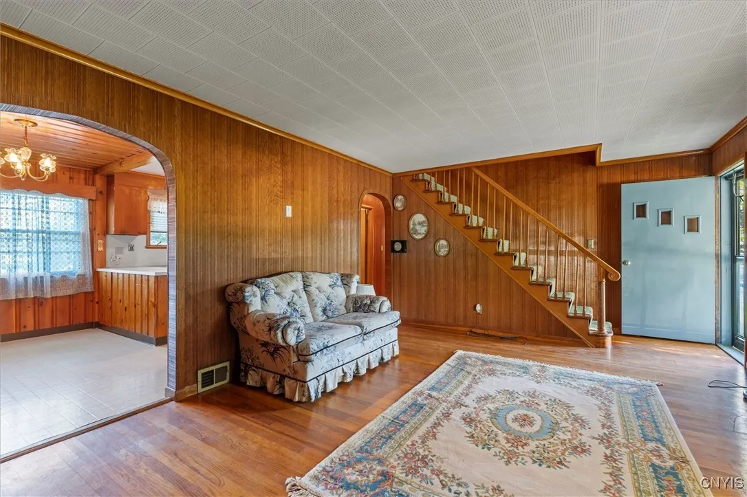 LR showing stairway to 2 upper bedrooms