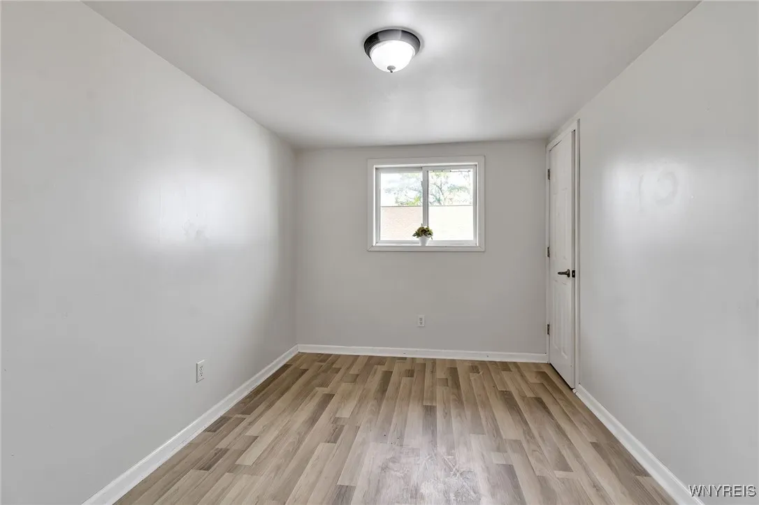 Bedroom in upper left rear apt