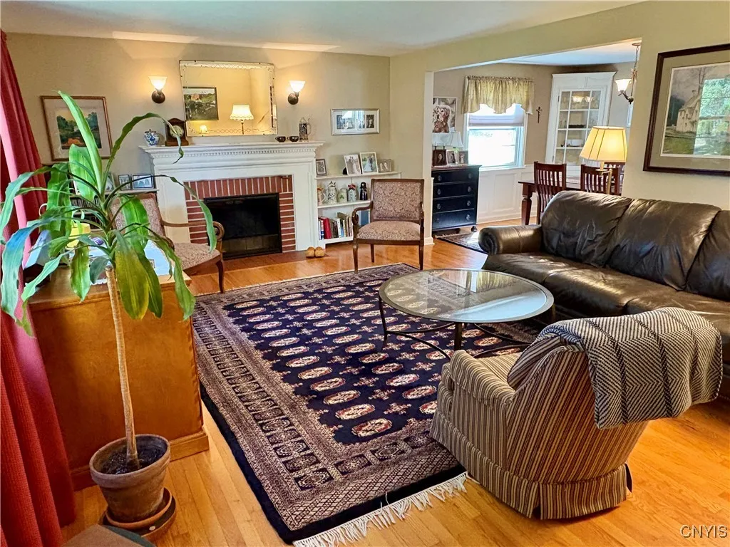 Large formal living room with fireplace and buil-ins