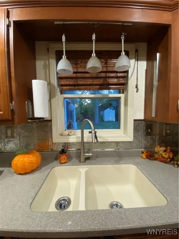Kitchen Window above Corian sink and countertop