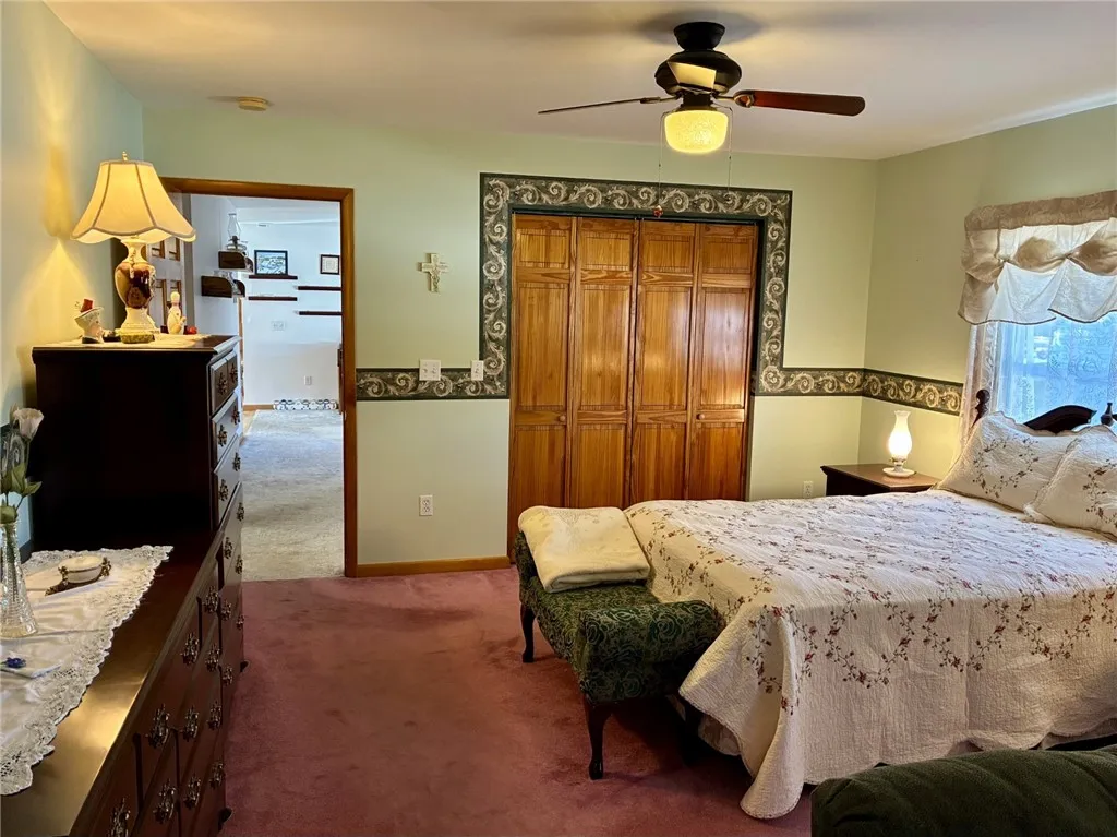 The primary en-suite is spacious! There's a walk-in closet and so much space for a multi-piece bedroom set.