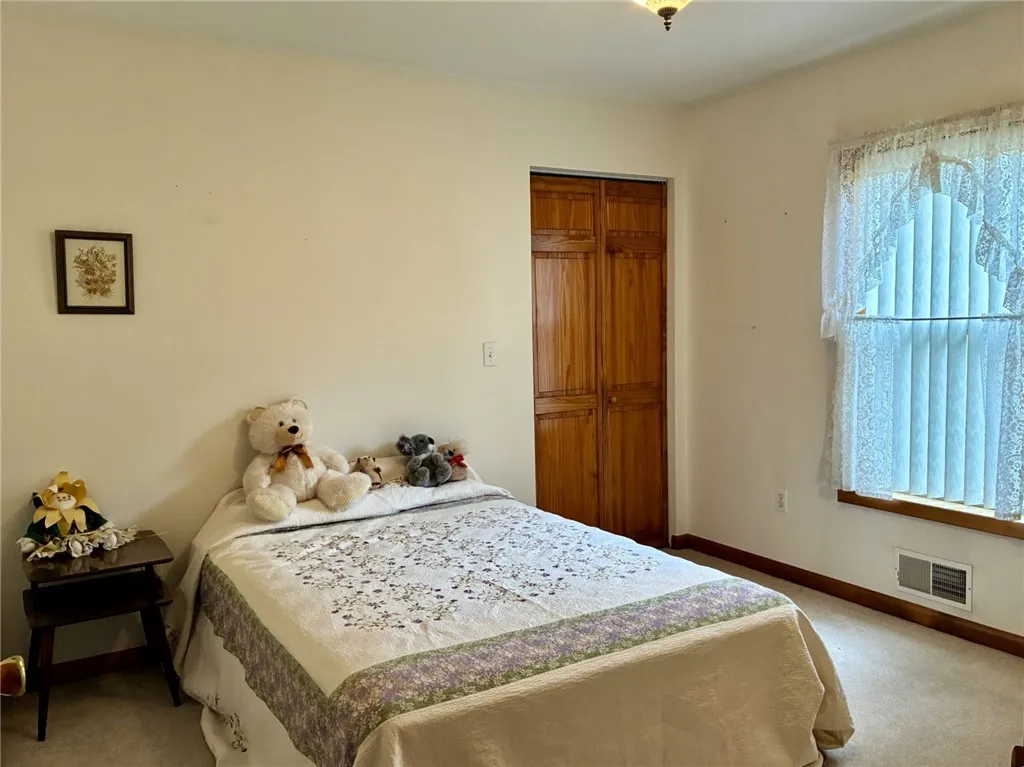 Guest bedroom 2 is also a nice size room and has a good storage closet.