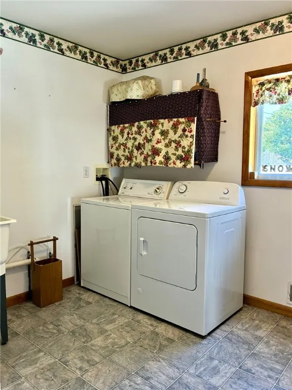 This truly is a laundry room. It has a washer & dryer, utility sink and storage shelves. There is plenty of room to make it do double duty as a mudroom by adding a coat and shoe rack.
