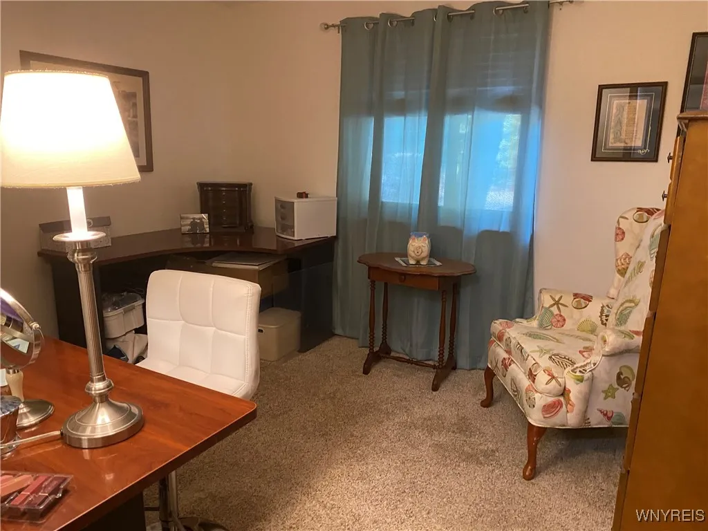Second of the 2 bedrooms currently being used as an office as sitting room