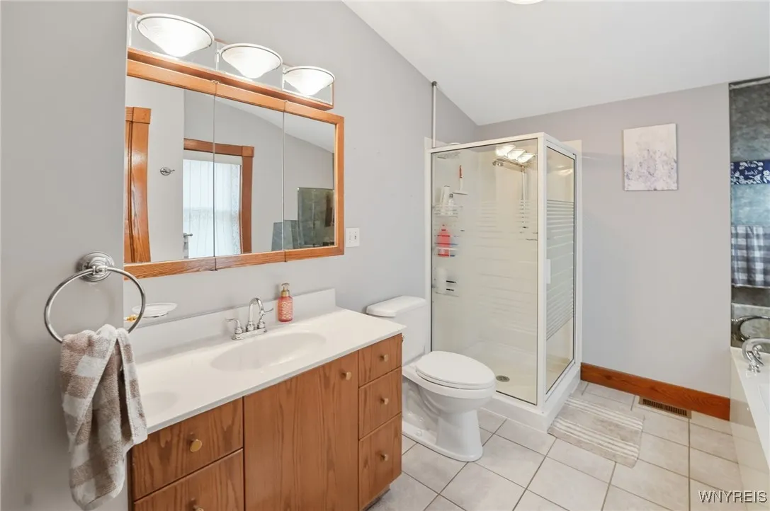 1st floor bath with separate shower & jetted tub.