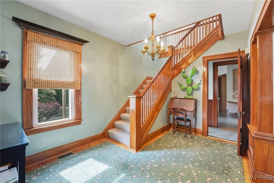 Entrance foyer ...beautiful oak staircase.