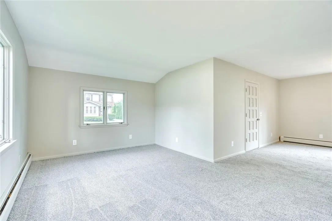 Brand new wall to wall carpeting on the first floor . . .