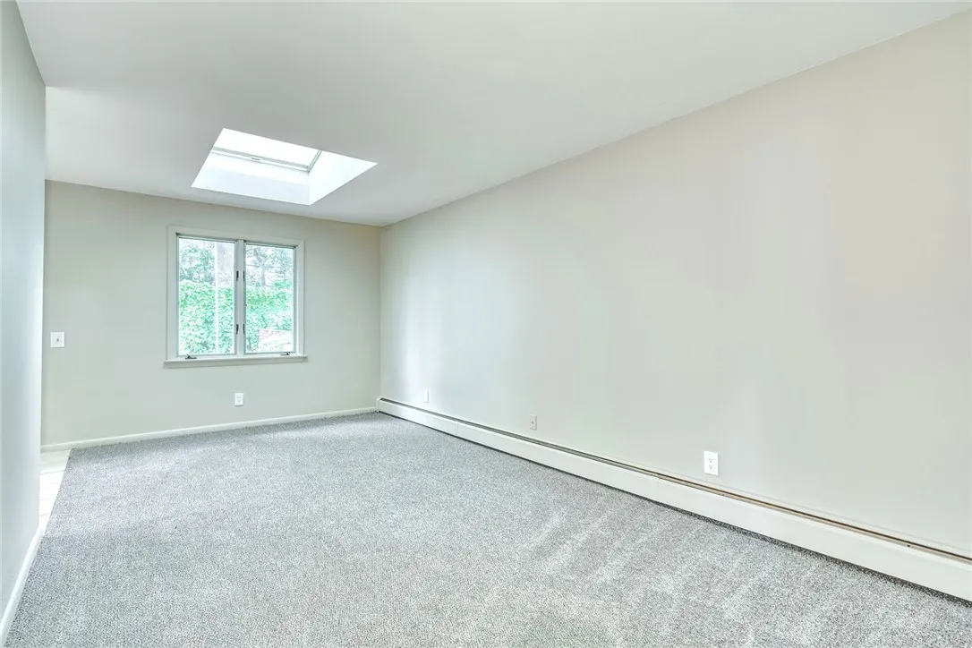 Skylight and rear window for natural light and breezy days. Interior room dimensions are approximately 9'6" x 18'6"