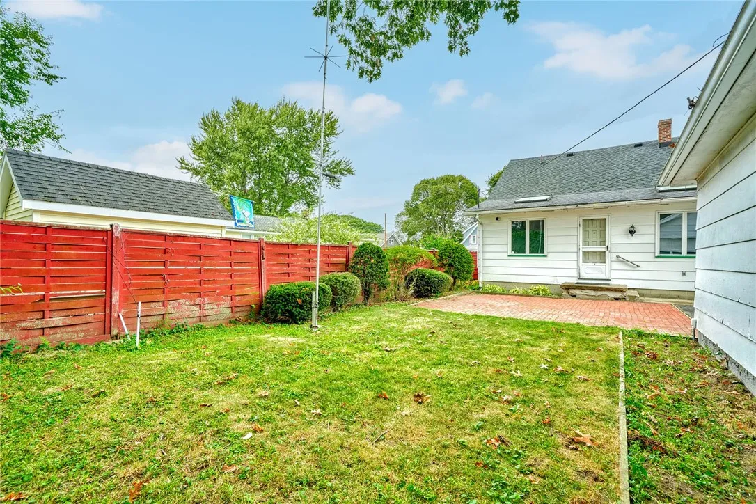 Yard is partially fenced . . .