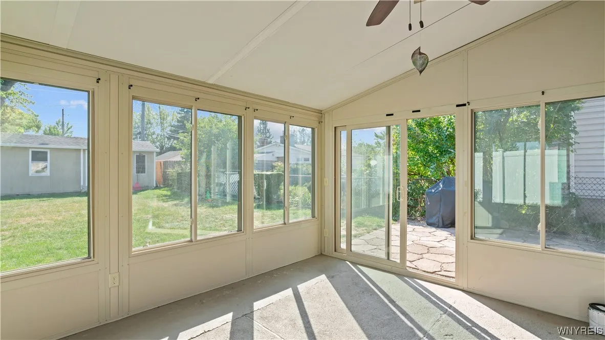3-Season Room with Sliding Door Leading to Yard