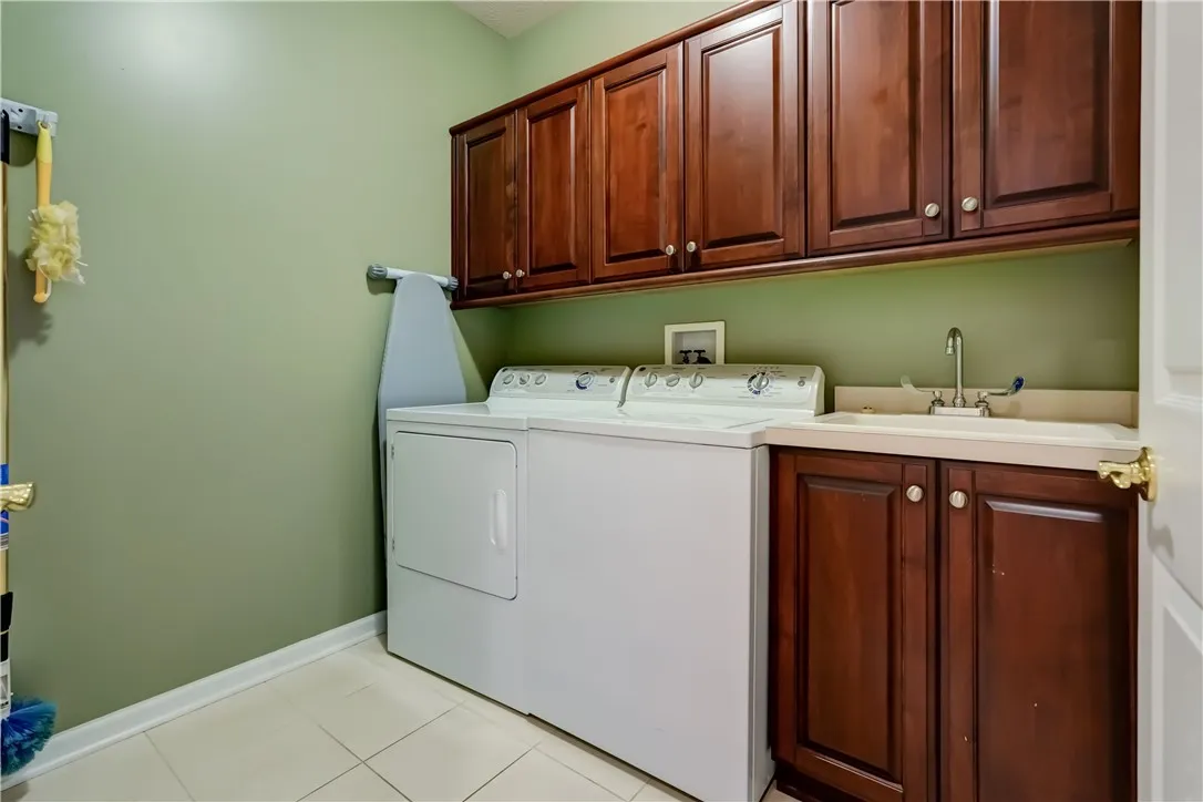 Convenient laundry room.