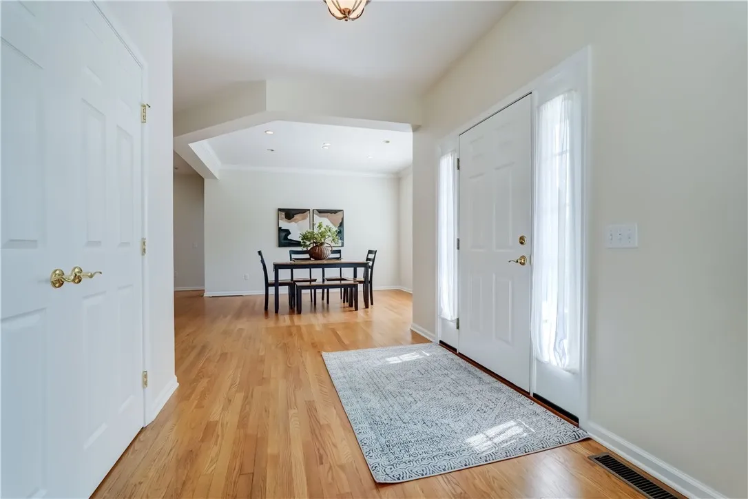 Front entry with view toward the dining room.