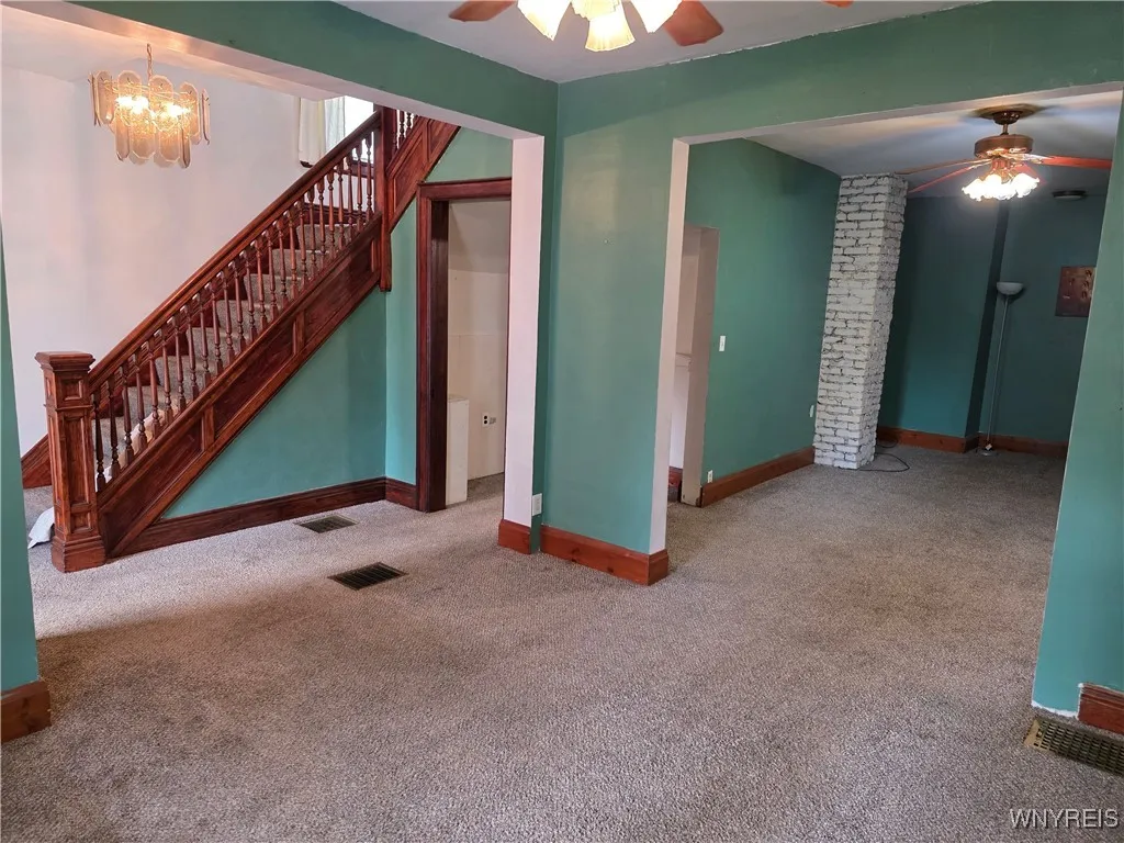 View into living room dining room, hall.