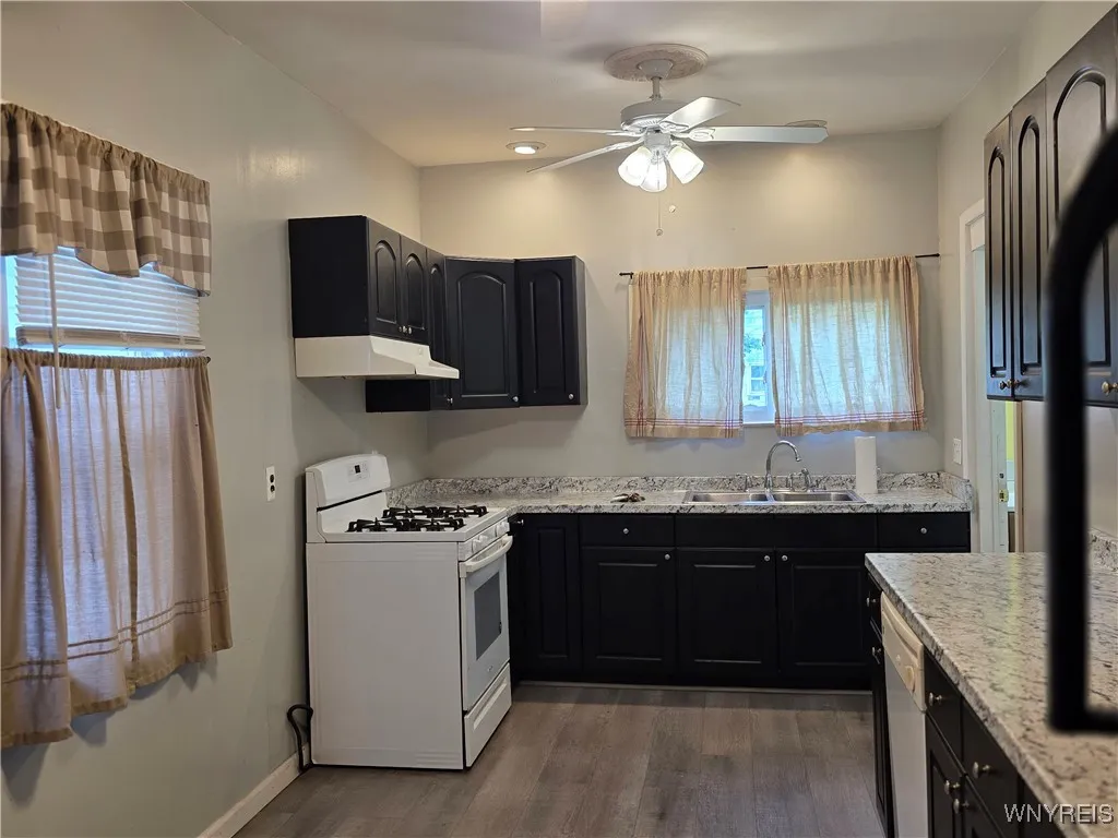 Plenty of cupboards, eating area or breakfast/coffee area
