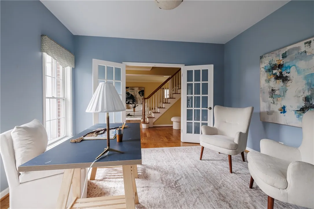 Use this office or reading room as you see fit! Opens to the front entry and has easy access to the half bath!