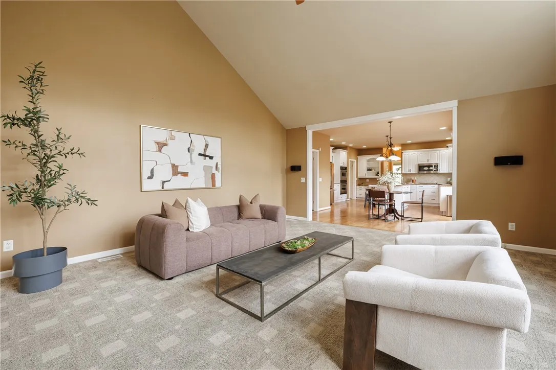 The den and kitchen are completely open, making for great entertaining space!