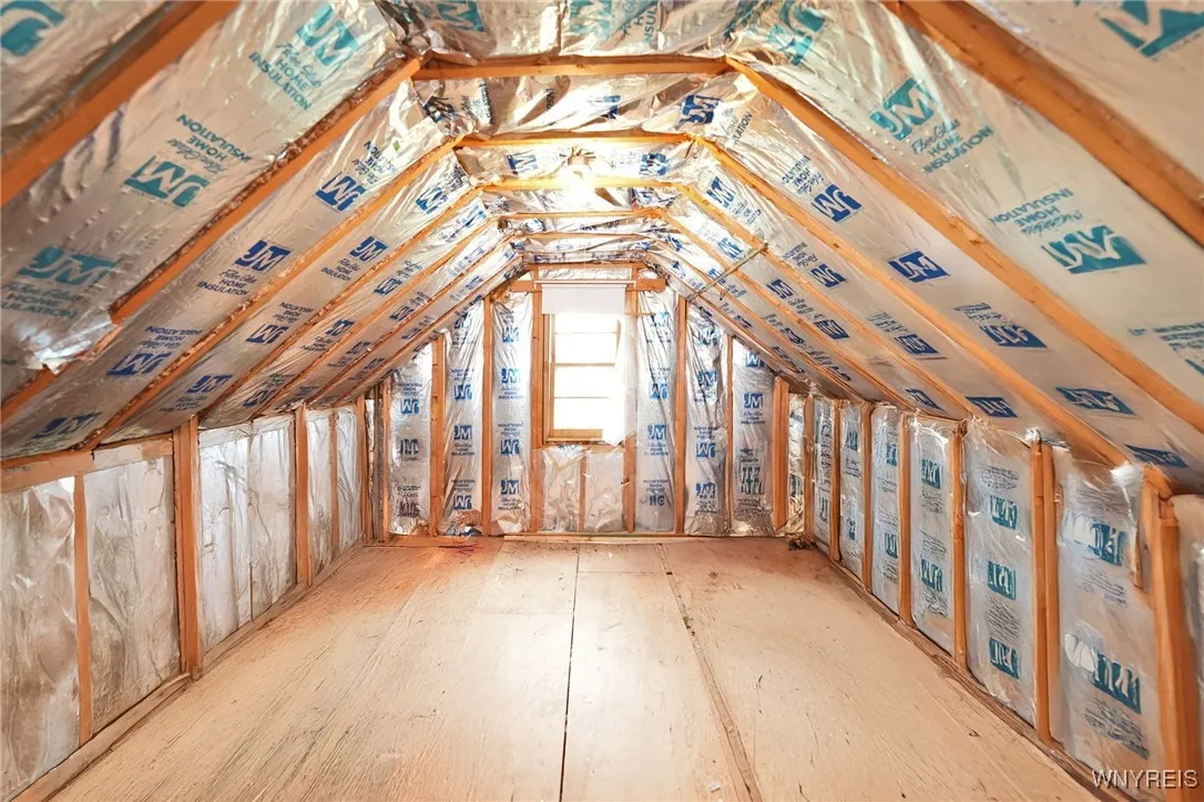 Huge 12 x 17 walk in attic space on 2nd floor, perfect for a 3rd bedroom. Just needs drywall and flooring!