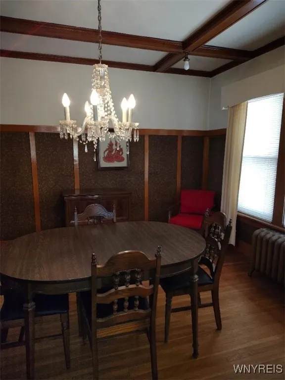 Lower Unit - dining room - note chandelier and coffered ceiling