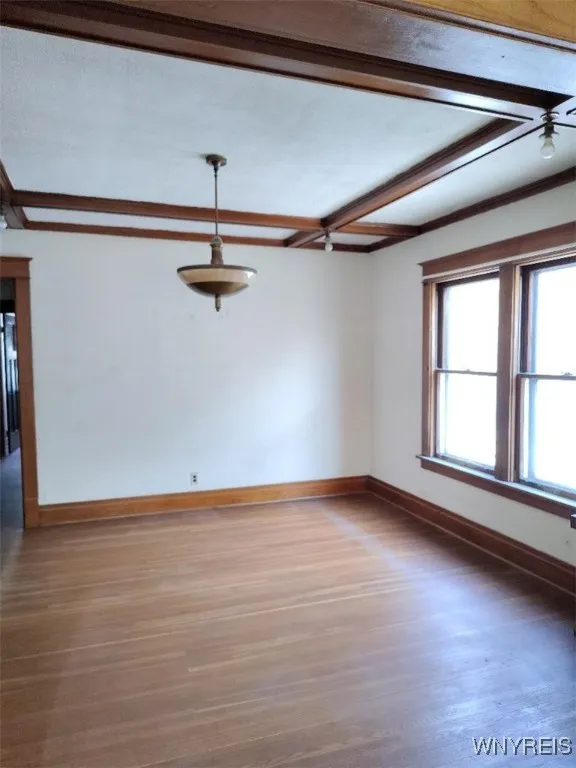 Upper unit - dining room, note coffered ceiling