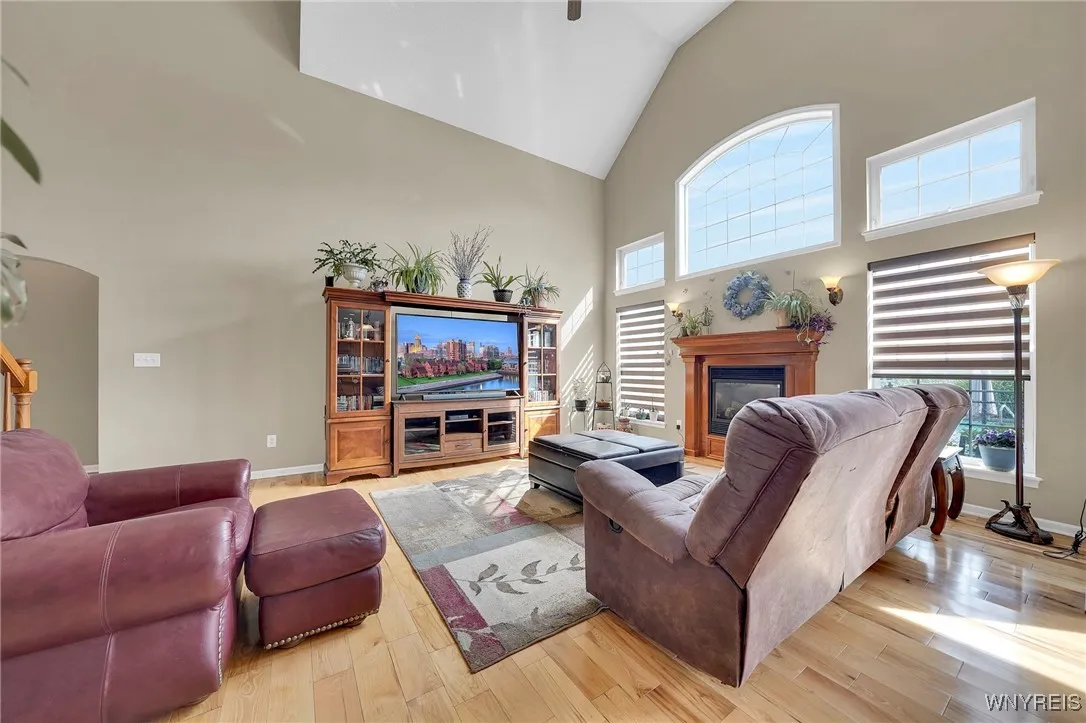 Bright, spacious living room. Wood floors throughout much of the home. Gas fireplace for those chilly days that are coming.