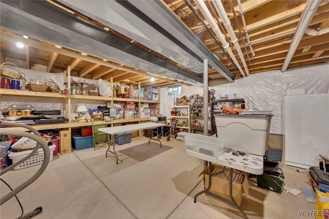 Section of basement that is not finished provides an enormous amount of storage.