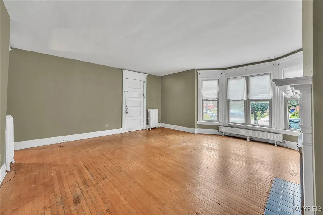 1st floor: View of living room by dining room
