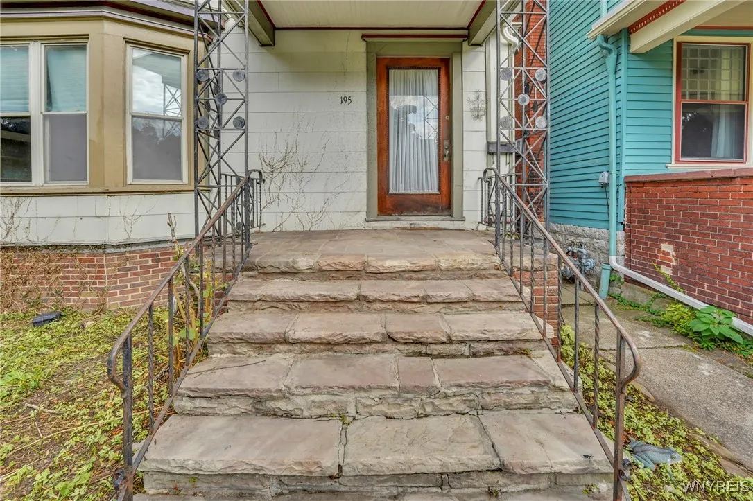 Original front sandstone steps and front porch