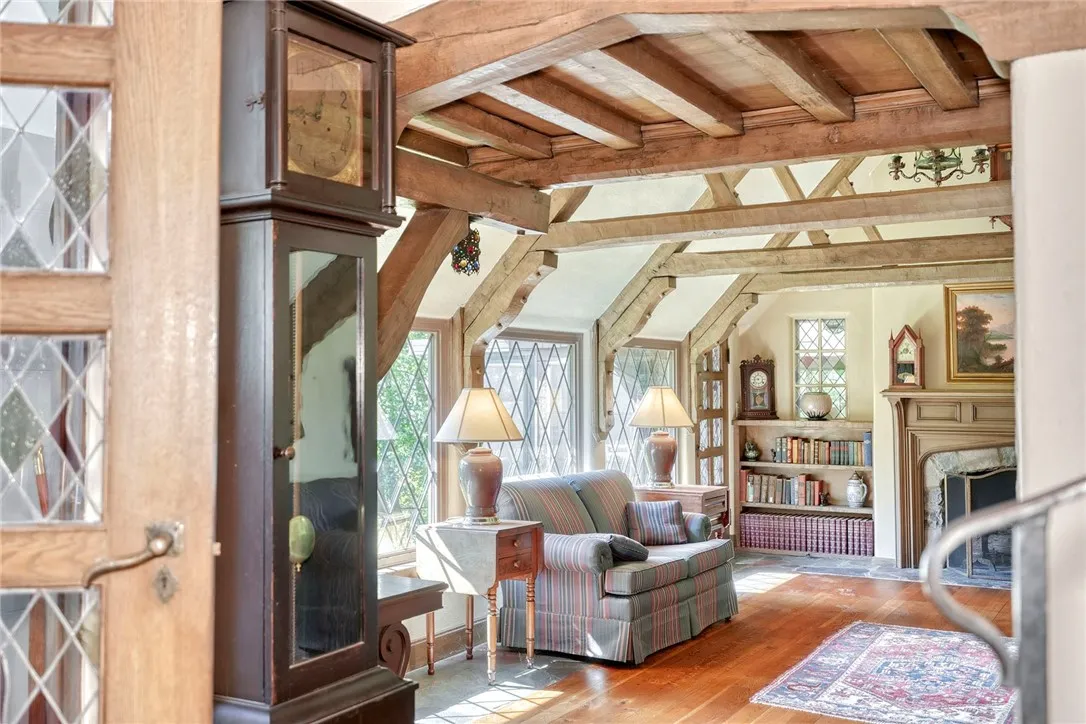 Living room with Balcony above