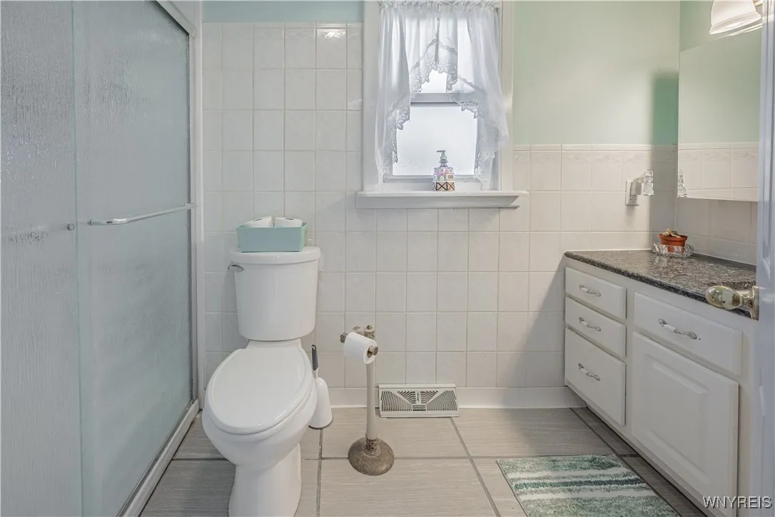 Walk in shower in the second floor bathroom room.