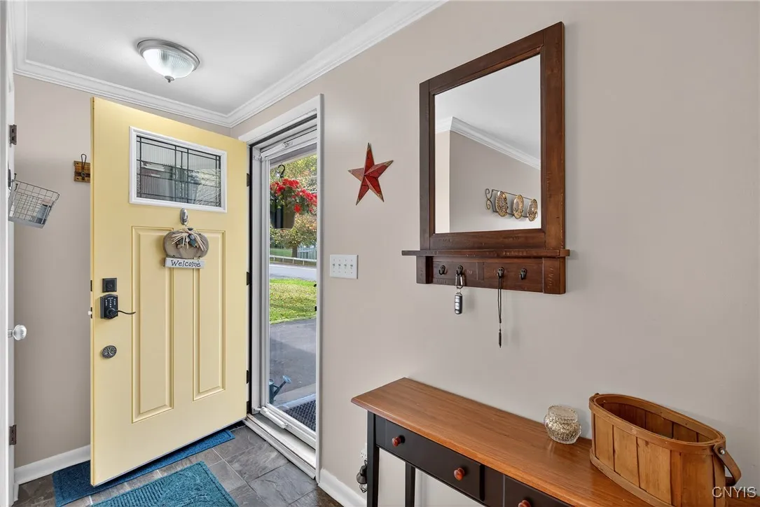 Stepping inside, a handy coat closet sits here at left just as you come in the door.