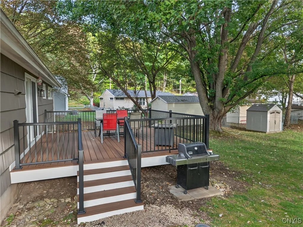 A small grill area was added just beside the steps here so the precious space on the deck can remain open for your seating furniture and fire table, etc.