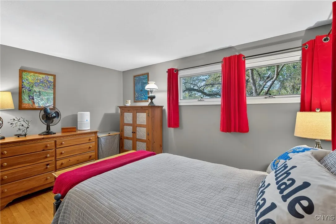This long room has enough space for big dressers as well as a larger bed.