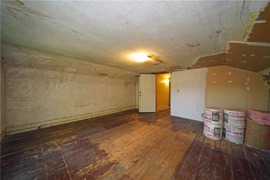 large unfinished second floor bedroom