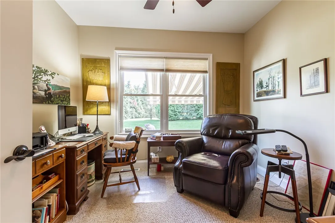 Great second bedroom or office on first floor- steps from Primary suite.  Overlooks rear yard.
