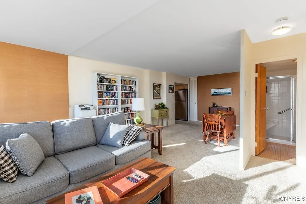 View from sliding glass door to balcony into open floor plan